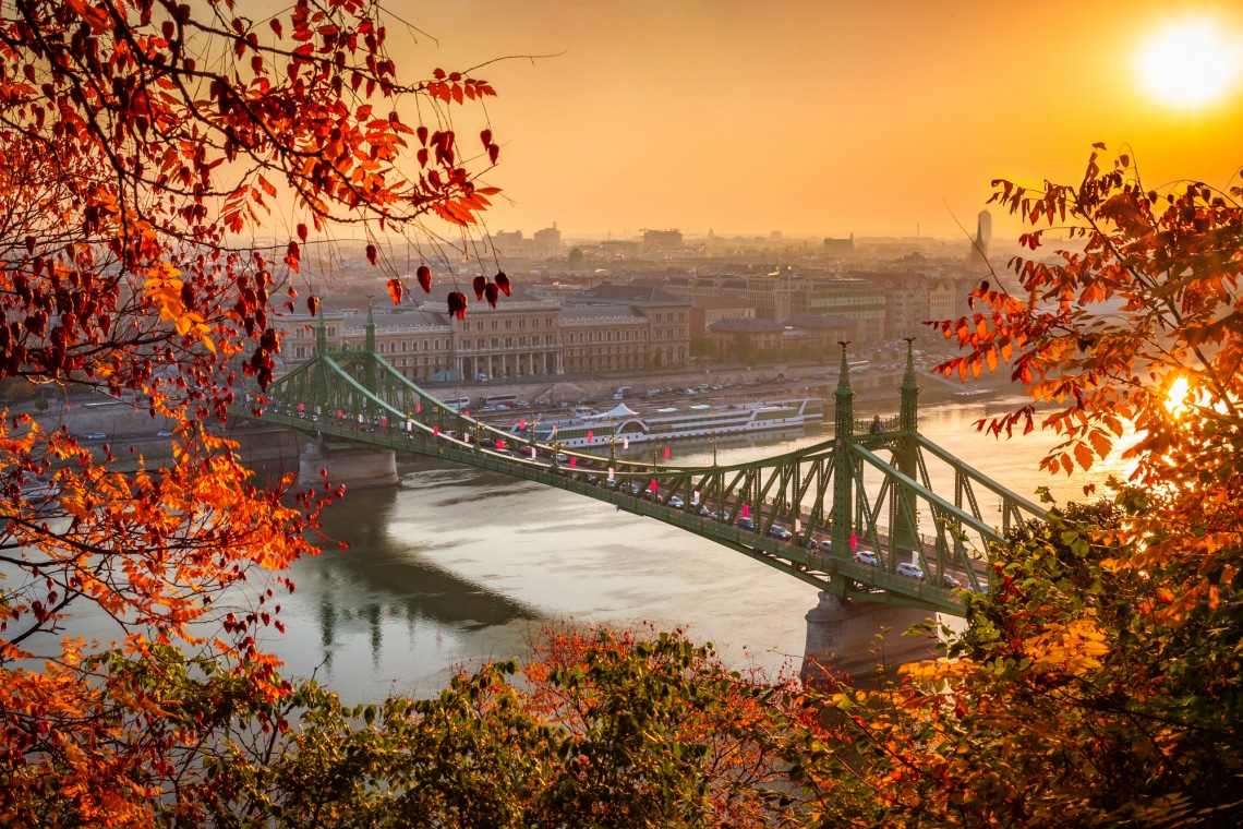 The Danube at golden hour with fall foliage